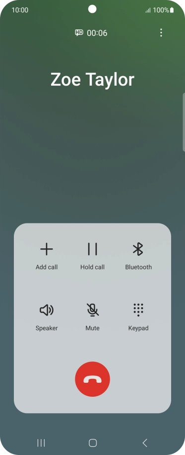 Press the end call icon.