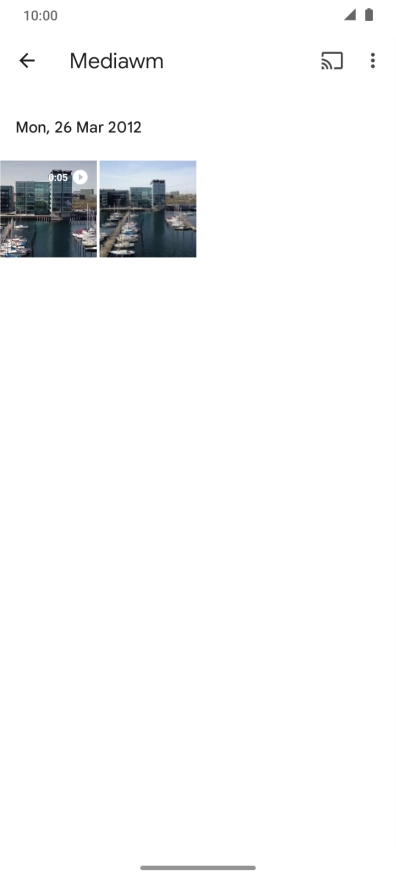 Press and hold the required picture or video clip. Press and hold the required picture or video clip.