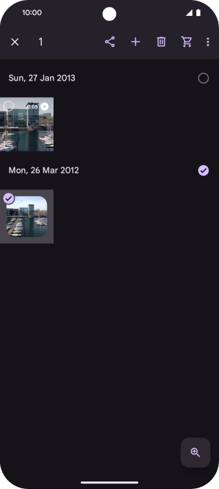 Press the required pictures or videos to select them.