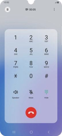 Press the end call icon.