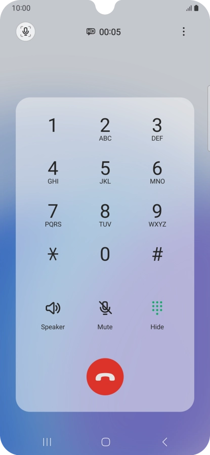 Press the end call icon.