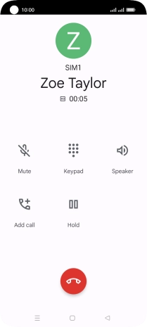Press the end call icon.