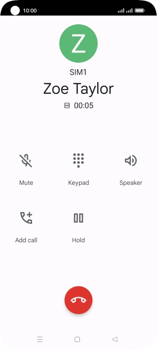 Press the end call icon.