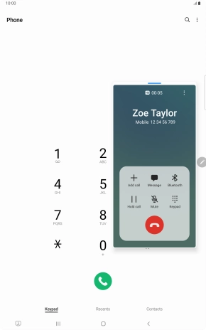 Press the end call icon.
