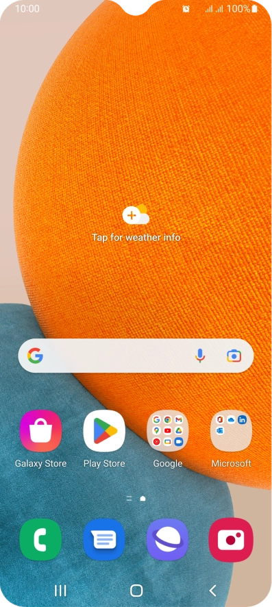 The alarm icon shows that the alarm is set.