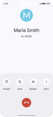 Press the end call icon.