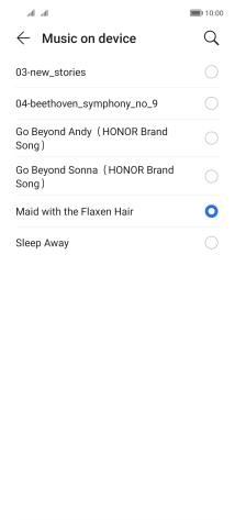 Once you've found a ring tone you like, press arrow left.