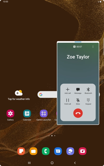 Press the end call icon.