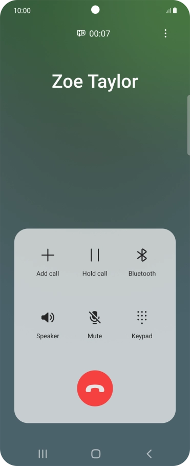 Press the end call icon.