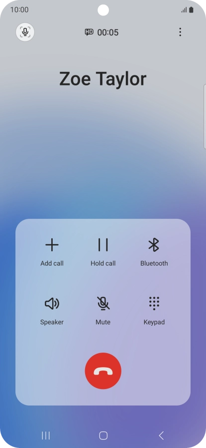 Press the end call icon.