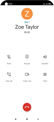Press the end call icon.