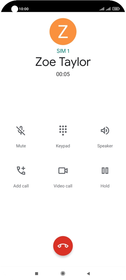 Press the end call icon.