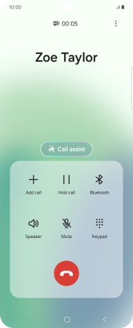 Press the end call icon.