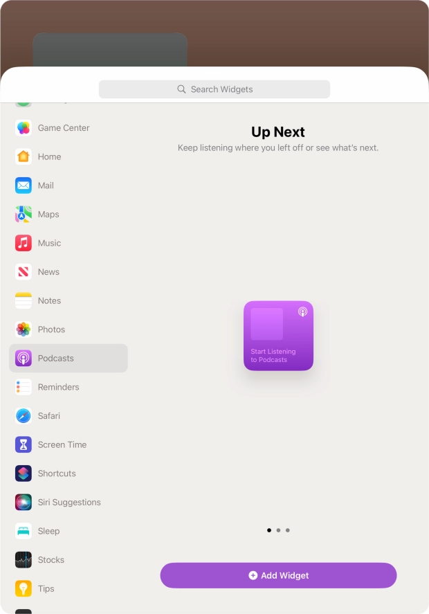 Slide your finger right or left on the screen to select the required widget size.