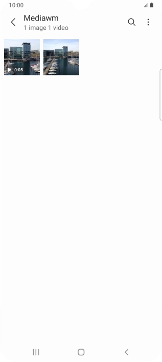 Press and hold the required picture or video clip. Press and hold the required picture or video clip.