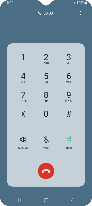 Press the end call icon.
