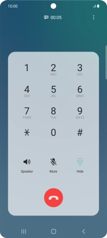 Press the end call icon.