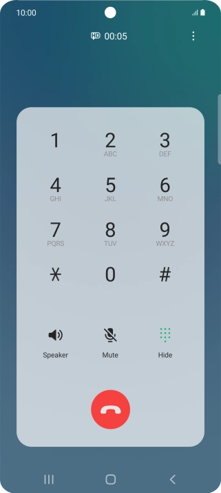 Press the end call icon.