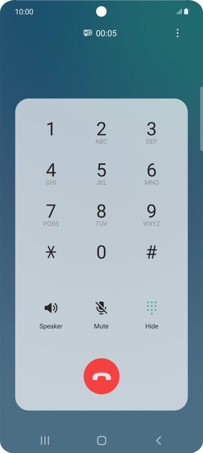Press the end call icon.
