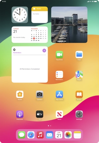 The alarm icon shows that the alarm is set.