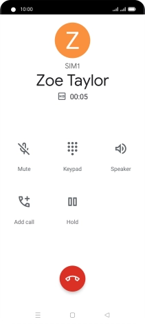 Press the end call icon.