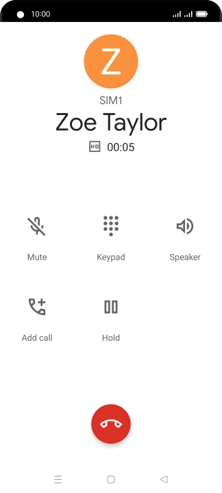 Press the end call icon.