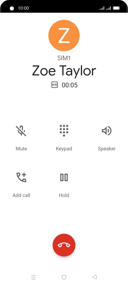 Press the end call icon.