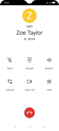 Press the end call icon.
