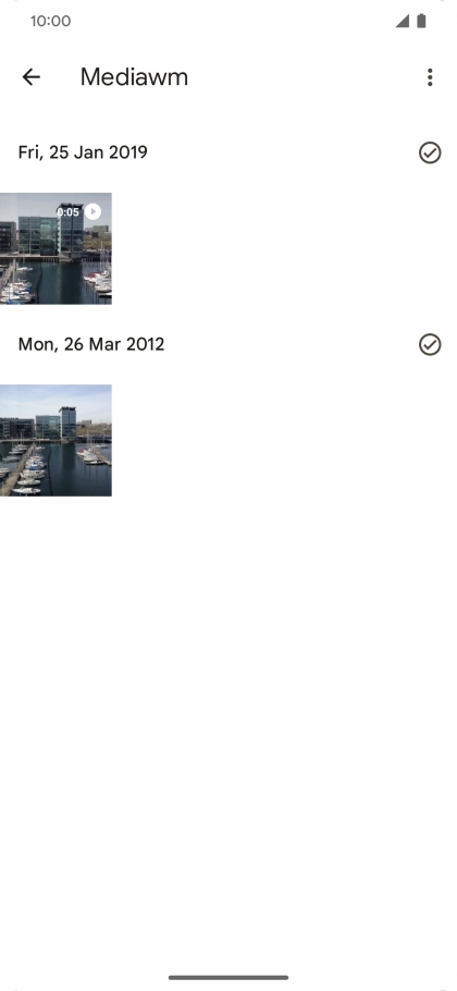 Press and hold any picture or video clip.