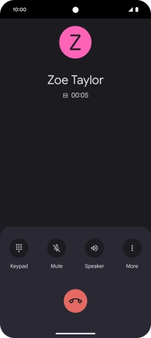 Press the end call icon.