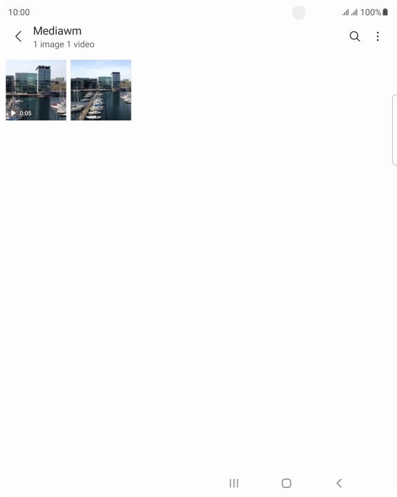 Press and hold the required picture or video clip. Press and hold the required picture or video clip.