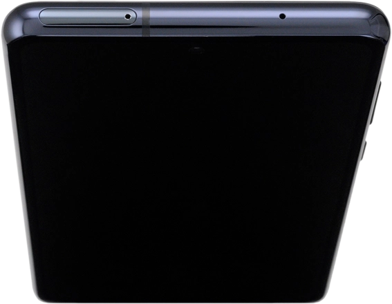 Find the opener for the card holder. Insert the opener into the small hole in the card holder.