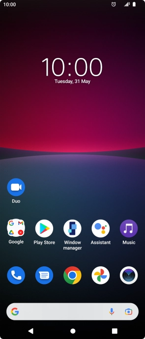 The alarm icon shows that the alarm is set.