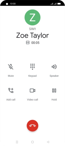 Press the end call icon.