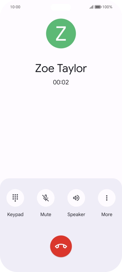 Press the end call icon.