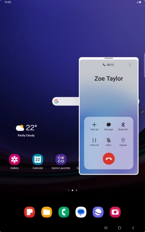 Press the end call icon.