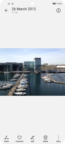 Slide your finger upwards starting from the bottom of the screen to return to the home screen.