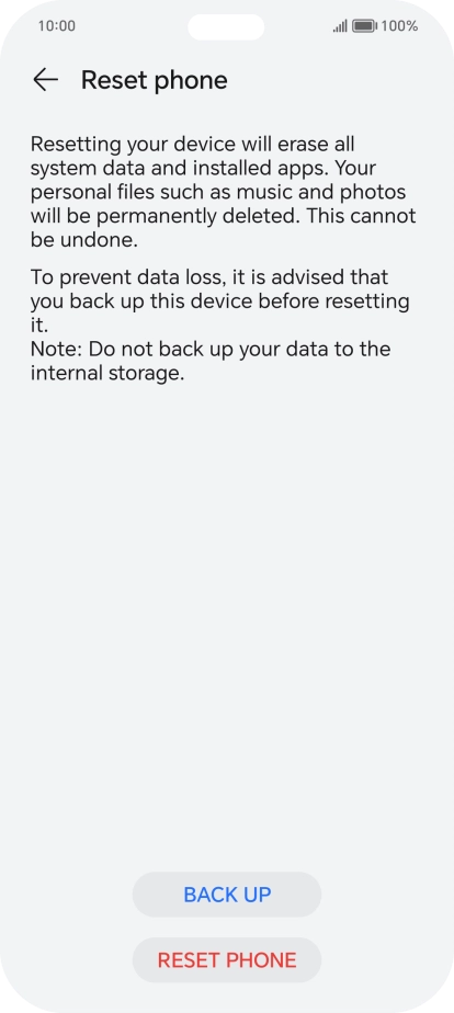 Press RESET PHONE. Wait a moment while the factory default settings are restored. Follow the instructions on the screen to set up your phone and prepare it for use.