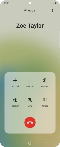 Press the end call icon.