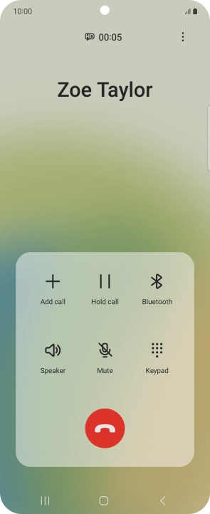 Press the end call icon.