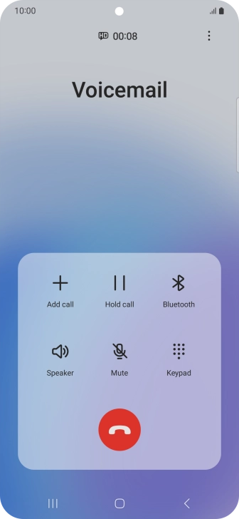Press the end call icon.