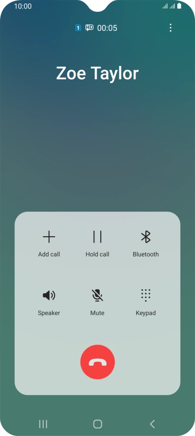 Press the end call icon.