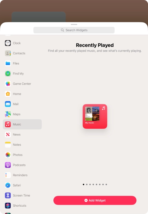 Slide your finger right or left on the screen to select the required widget size.