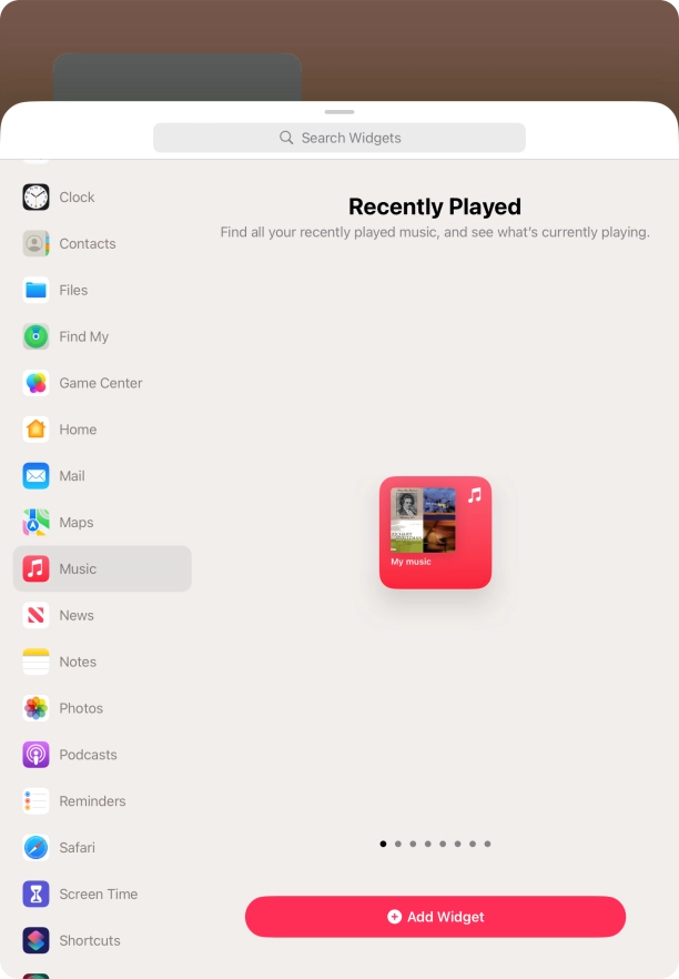 Slide your finger right or left on the screen to select the required widget size.