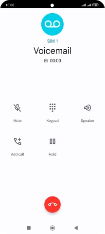 Press the end call icon.
