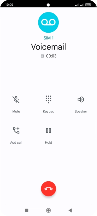 Press the end call icon.