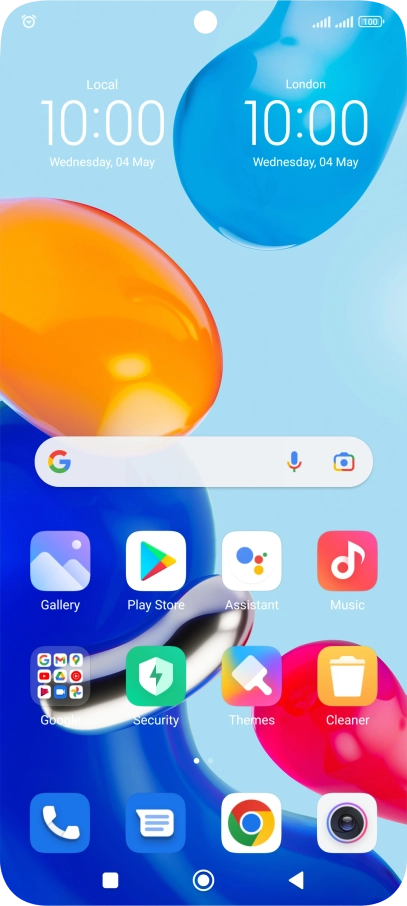 The alarm icon shows that the alarm is set.