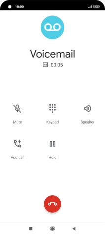 Press the end call icon.