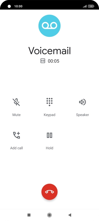 Press the end call icon.