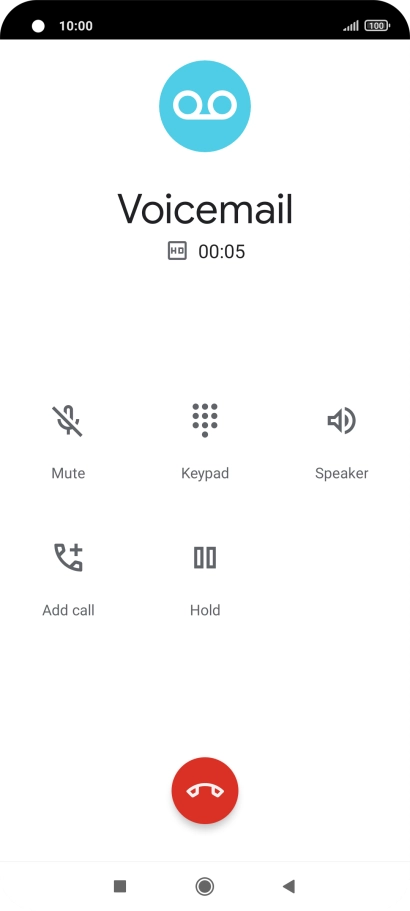 Press the end call icon.